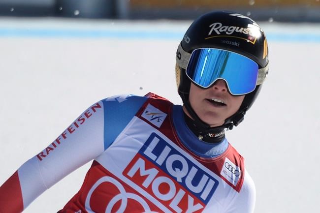 Switzerland's Lara Gut-Behrami reacts after completing an alpine ski, women's World Cup super G, in Val di Fassa, Italy, Sunday, Feb. 28, 2021. (AP Photo/Elvis Piazza)