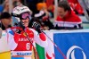 Switzerland's Michelle Gisin reacts as she crosses the finish line of an alpine ski, women's World Cup downhill, in Altenmarkt-Zauchensee, Austria, Saturday, Jan. 11, 2020. (AP Photo/Giovanni Auletta)