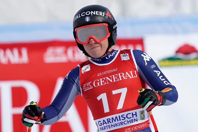 Italy's Sofia Goggia reacts after completing an alpine ski, women's World Cup super-G race in Garmisch-Partenkirchen, Germany, Saturday, Jan. 30, 2021. (AP Photo/Giovanni Auletta)