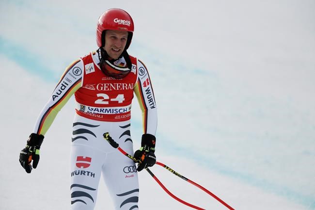 Germany's Josef Ferstl skis down after falling during an alpine ski, men's World Cup downhill, in Garmisch-Partenkirchen, Germany, Friday, Feb. 5, 2021. (AP Photo/Gabriele Facciotti)