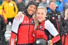 Third placed Kaillie Humphries and Sylvia Hoffmann, left, of the USA pose for media after their second run at the women's two-man bobsled World Cup race in Igls, near Innsbruck, Austria, Saturday, Jan. 18, 2020. (AP Photo/Kerstin Joensson)