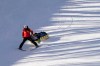 Austria's Nicole Schmidhofer is carried by a toboga after crashing during an alpine ski, women's World Cup Downhill, in Val d'Isere, France, Friday, Dec.18, 2020. (AP Photo/Giovanni Auletta)