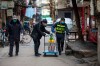 Chinatopix / The Associated Press Files
Government workers spray disinfectant along a street in Wuhan in central China's Hubei Province, Tuesday, Jan. 28, 2020. Hong Kong's leader announced Tuesday that all rail links to mainland China will be cut starting Friday as fears grow about the spread of a new virus. (Chinatopix via AP)