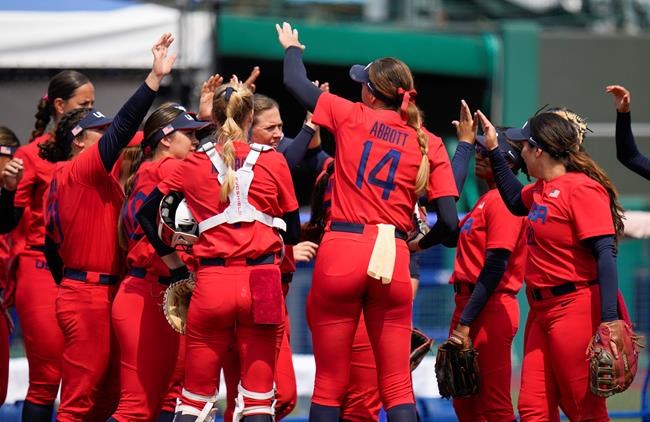 United States players celebrate after defeating Italy in their softball game at the 2020 Summer Olympics, Wednesday, July 21, 2021, in Fukushima, Japan. (AP Photo/Jae C. Hong)