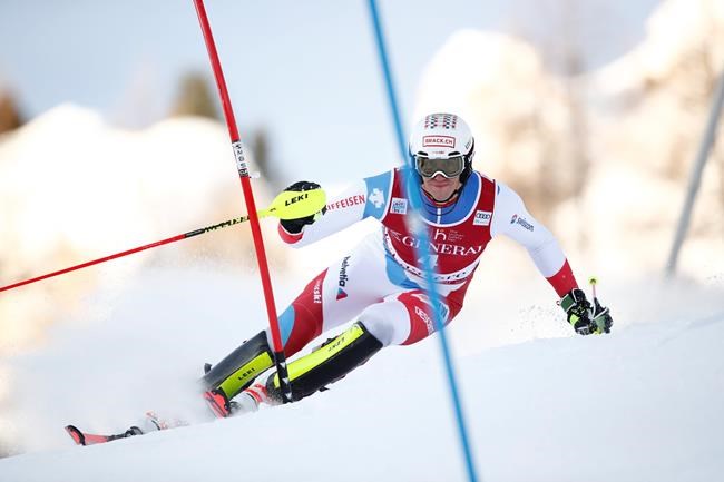 Switzerland's Ramon Zenhausern competes during an alpine ski, men's World Cup slalom in Val d' Isere, France, Sunday, Dec. 15, 2019. (AP Photo/Marco Trovati)