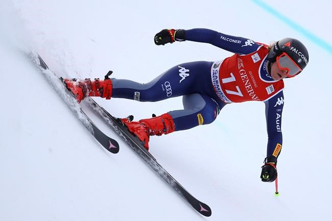 Italy's Sofia Goggia speeds down the course during an alpine ski, women's World Cup super-G race in Garmisch-Partenkirchen, Germany, Saturday, Jan. 30, 2021. (AP Photo/Marco Trovati)