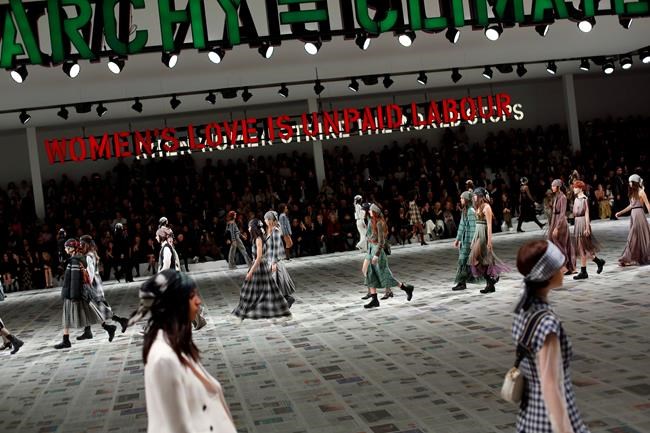 Models wear creations for the Dior fashion collection during Women's fashion week Fall/Winter 2020/21 presented in Paris, Tuesday, Feb. 25, 2020. (AP Photo/Thibault Camus)