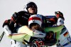 The German team celebrates winning the bronze medal during a mixed team parallel slalom, at the alpine ski World Championships, in Cortina d'Ampezzo, Italy, Wednesday, Feb. 17, 2021. (AP Photo/Gabriele Facciotti)