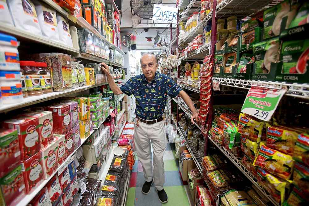 SHANNON VANRAES / WINNIPEG FREE PRESS
Halal stores serving as a safe space for newcomers might seem like a heavy responsibility to some, but Abdulrehman waves it off. Creating a safe space for everyone is just part of the job, he said