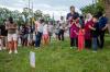 Brett Gundlock - THE CANADIAN PRESS
People attend a memorial at the location where a family of five was hit by a driver, in London, Ont., Monday, June 7, 2021. Four of the members of the family died and one is in critical condition. A 20 year old male has been charged.