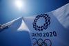 Kiichiro Sato - AP
A Tokyo 2020 Olympic flag flies over the top of the bleachers at Ariake Tennis Center on Monday in Tokyo.