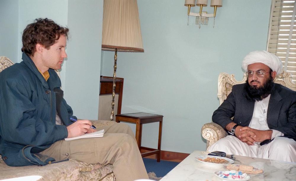 Karen Mazurkewich - for the Toronto Star
Martin Regg Cohn, left, speaks with Wakil Ahmad Muttawakil at the Afghanistan foreign ministry in Kabul in February 2000.