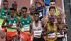 Rick Madonik - Toronto Star
Canada's Moh Ahmed, centre, passed Uganda’s Joshua Cheptegei with about 750 metres to go in the 10,000 metres, hoping to run to gold. He couldn’t hold on, finishing sixth.