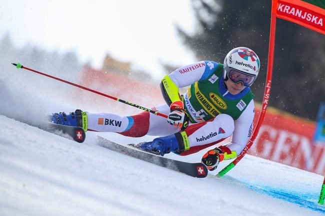 Switzerland's Marco Odermatt competes during an alpine ski, World Cup men's giant slalom in Kranjska Gora, Slovenia, Saturday, March 13, 2021. (AP Photo/Marco Trovati)