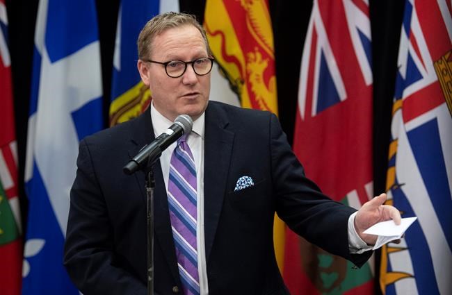 Mantiba Finance Minister Scott Fielding speaks with the media before a meeting with federal and provincial counterparts in Ottawa, Tuesday, Dec. 17, 2019. THE CANADIAN PRESS/Adrian Wyld
