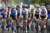 MICHAEL STEELE - POOL/AFP via GETTY IMAGES
Canada's Alison Jackson (second from the left) rides in the peloton in the women's cycling road race of the Tokyo 2020 Olympic Games on Sunday.