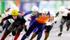 Canada's Ivanie Blondin, left, and Irene Schouten, center, sprint towards the finish line of the women's mass start race in the final of the World Cup speedskating at the Thialf ice arena in Heerenveen, northern Netherlands, Sunday, March 8, 2020. (AP Photo/Peter Dejong)