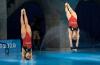 Frank Gunn - THE CANADIAN PRESS
Caeli McKay (right) and Meghan Benfeito perform a dive on their way to fourth place in the women’s 10-metre synchronized diving competition at the Tokyo Olympics on Tuesday.