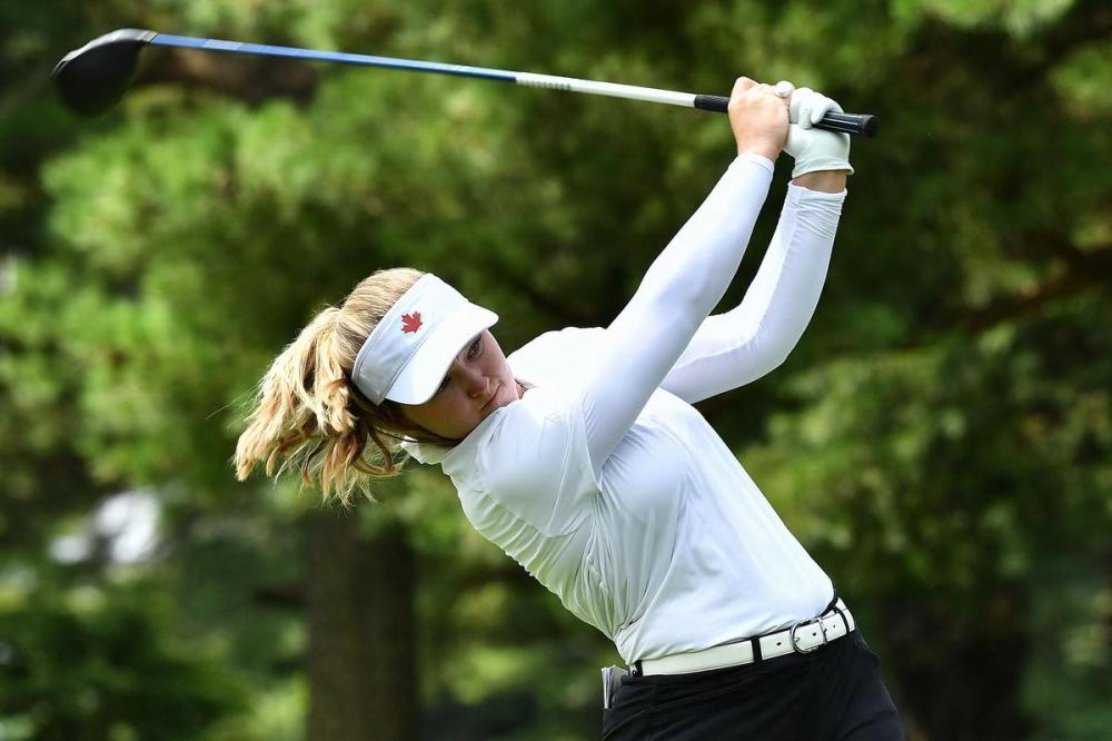 KAZUHIRO NOGI - AFP via GETTY IMAGES
Canada's Brooke Henderson watches her drive from the ninth tee in Round 1 of the womens’s golf individual stroke play during the Tokyo Olympics on Wednesday.