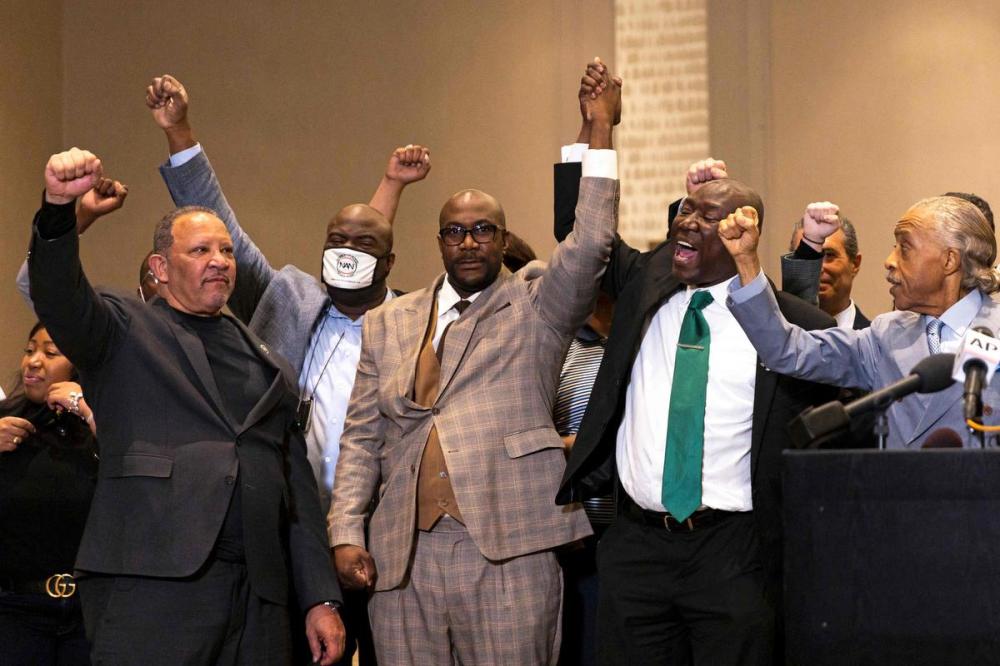 KEREM YUCEL - AFP VIA GETTY IMAGES
George Floyd’s brother Philonise Floyd, centre, flanked by Reverend Al Sharpton and lawyer Ben Crump during a press conference following the verdict in the trial of former police officer Derek Chauvin. Rosie DiManno says the gratitude expressed in the U.S. on Thursday evening for a righteous outcome, particularly among Black Americans, was almost … piteous.