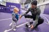 GEOFF ROBINS - Toronto Star
Damian Warner shows his son Theo his Lou Marsh trophy at Thompson Recreation and Athletic Centre at Western University in London, Ont. on Monday.
