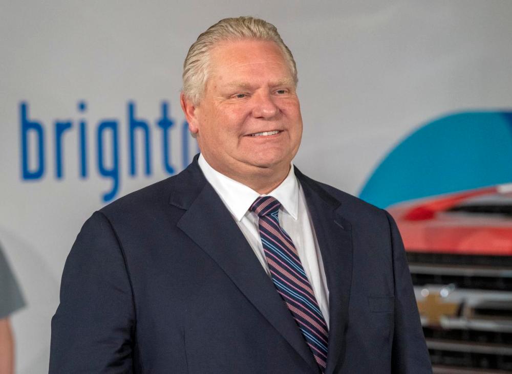 Frank Gunn - THE CANADIAN PRESS
Premier Doug Ford listens during an announcement at General Motors Canada’s Canadian Technical Centre, McLaughlin Advanced Technology Track in Oshawa on April 4, 2022.