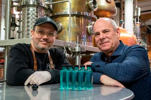 Spirit of York Head Distiller Mark Harrop (left) and founder Gerry Guitor pose with bottles of distillery-made hand sanitizer in Toronto on Wednesday March 18, 2020. With an outbreak of the novel coronavirus sweeping across Canada, Toronto-based Spirit of York Distillery Co. had an urge to do something to help, so they looked no further than the company's production facility. Instead of pumping out its usual vodkas and gins, the company decided to make something Canadians have been emptying from store shelves: hand sanitizer. THE CANADIAN PRESS/Frank Gunn