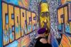 Julio Cortez - AP
Damarra Atkins paid her respects to George Floyd at a mural at George Floyd Square on April 23, 2021, in Minneapolis, Minn.