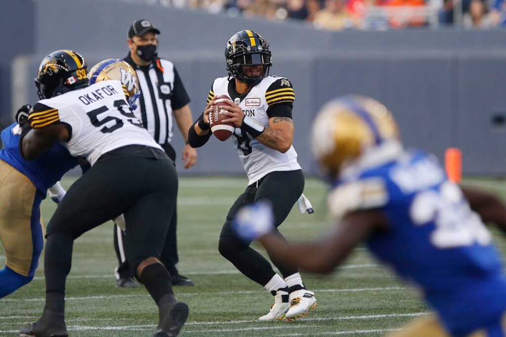 CP
Hamilton Tiger-Cats quarterback Jeremiah Masoli drove his team down the field on the opening drive, but couldn't score another point after that. (John Woods / The Canadian Press)
