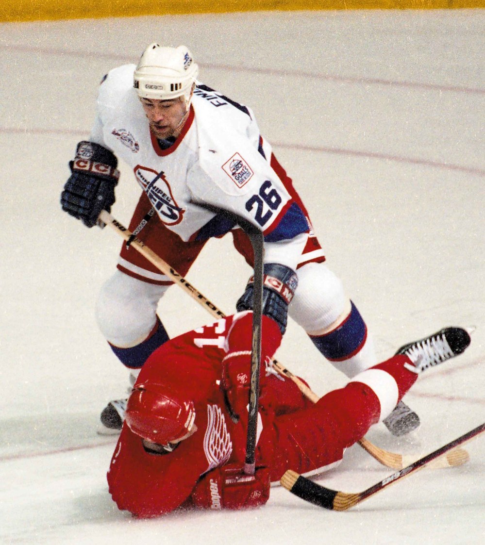 JOE BRYKSA / FREE PRESS FILES
Jeff Finley takes down Vyacheslav Kozlov.