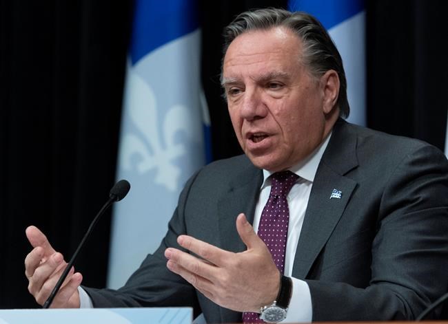 Quebec Premier Francois Legault announces his intention to re-open primary schools in tow weeks, during a news conference on the COVID-19 pandemic, Monday, April 27, 2020 at the legislature in Quebec City. THE CANADIAN PRESS/Jacques Boissinot