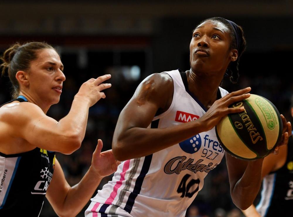 Tracey Nearmy - GETTY IMAGES
At 30, Canadian Kayla Alexander, right, will make her Olympic debut against Serbia on Monday.