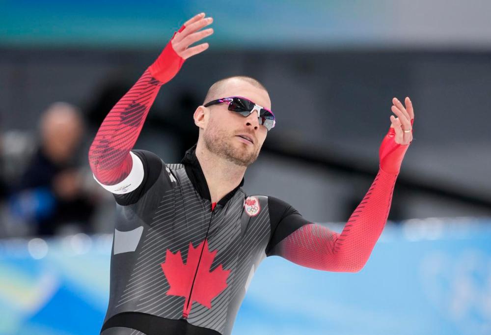Paul Chiasson - THE CANADIAN PRESS
Canada's Laurent Dubreuil reacts after learning he missed out on the medal podium in the men's 500-metre speedskating competition at the 2022 Winter Olympics in Beijing on Saturday.