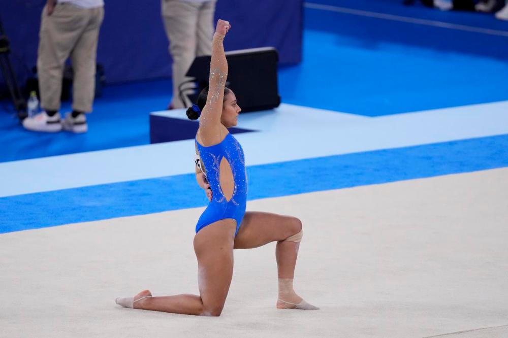 Gregory Bull - AP
Luciana Alvarado, of Costa Rica, performs her floor exercise routine during the women's artistic gymnastic qualifications at the 2020 Summer Olympics, Sunday, July 25, 2021, in Tokyo.