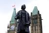 Sean Kilpatrick - THE CANADIAN PRESS
A statue of Sir John A. Macdonald is pictured on Parliament Hill in Ottawa on, June 3, 2021. The Canada flag on the Peace Tower flies at half-staff in recognition of the discovery of children's remains at the site of a former residential school in Kamloops, B.C.