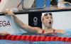 Rick Madonik - Toronto Star
Maggie Mac Neil reacts after winning gold in the Women's 100m Butterfly on Monday.