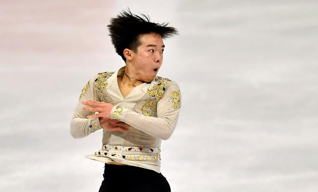 Yuma Kagiyama of Japan performs during the Men Short Program at the Figure Skating World Championships in Stockholm, Sweden, Thursday, March 25, 2021. (AP Photo/Martin Meissner)