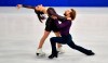Kaitlin Hawayek and Jean-Luc Baker of the USA perform during the Ice Dance - Rhythm Dance at the Figure Skating World Championships in Stockholm, Sweden, Friday, March 26, 2021. (AP Photo/Martin Meissner)