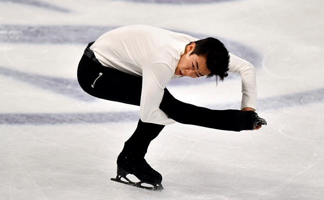 Nathan Chen of the USA performs during the Men Short Program at the Figure Skating World Championships in Stockholm, Sweden, Thursday, March 25, 2021. (AP Photo/Martin Meissner)