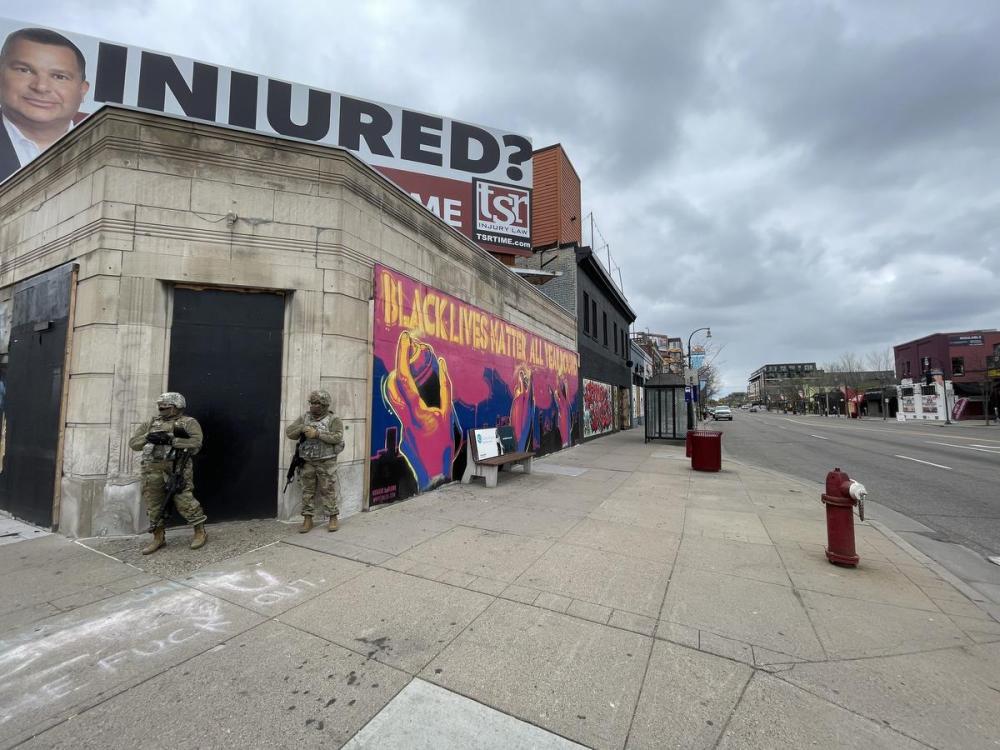 EDWARD KEENAN - TORONTO STAR
National Guard troops stand guard on the streets of Minneapolis as the trial of Derek Chauvin in George Floyd’s death wraps up April 19, 2021.