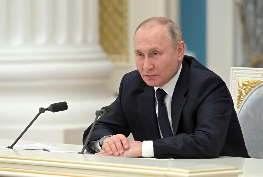 Alexey Nikolsky/Sputnik/AFP - TNS
Russian President Vladimir Putin chairs a meeting of big businesses at the Kremlin in Moscow on Feb. 24, 2022.