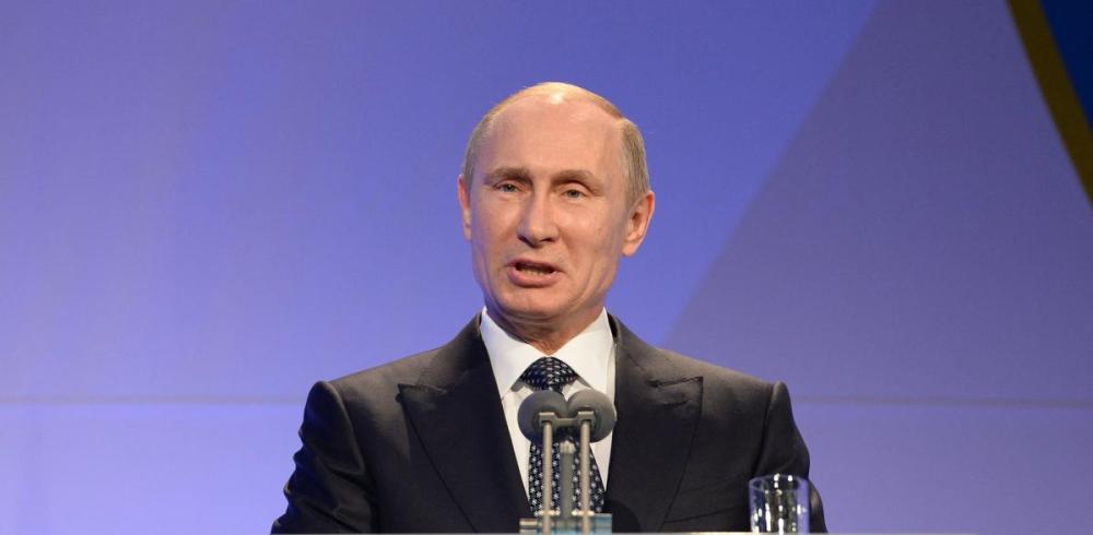 ANDREJ ISAKOVIC - POOL/AFP via GETTY IMAGES
Russian President Vladimir Putin delivers his speech at the International Olympic Committee Gala Dinner on Feb 6, 2014 in Sochi, on the eve of the Sochi 2014 Olympic Winter Games opening ceremony. Putin proclaimed his imminent conquest of a neighbouring Ukraine with vile rhetoric, imagining he’d be welcomed with open arms or downcast eyes but he was wrong, Martin Regg Cohn writes.