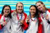 Frank Gunn - THE CANADIAN PRESS
From left, Canada's Margaret Mac Neil, Rebecca Smith, Kayla Sanchez and Penny Oleksiak celebrate a silver medal in the women's 4x100-metre freestyle relay at the Tokyo Olympics on Sunday.