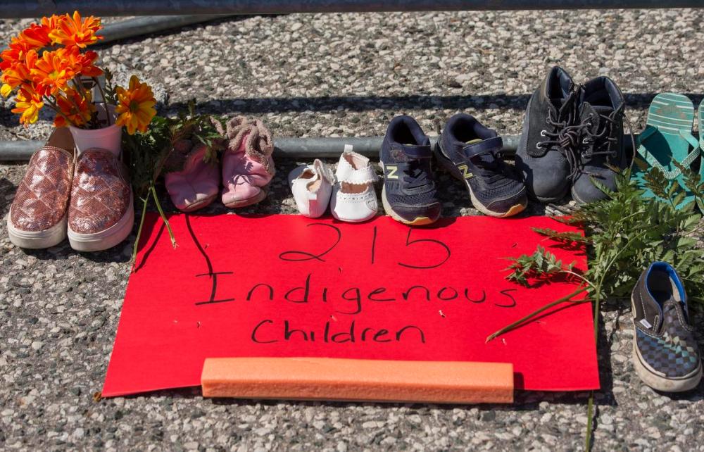 Rick Madonik - Toronto Star
Several Ontario cities including Toronto, Mississauga and Brampton are lowering their flags to honour the children whose remains were discovered in a mass grave at what used to be one of the country’s biggest residential schools, Kamloops Indian Residential School.