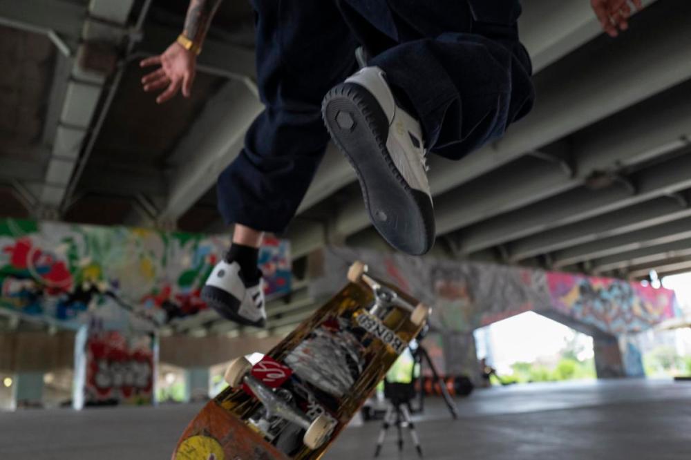 Paige Taylor White - Toronto Star
Canadian street skateboarder T.J. Rogers demonstrates a few basic moves to help audiences understand what to look for at Olympics.