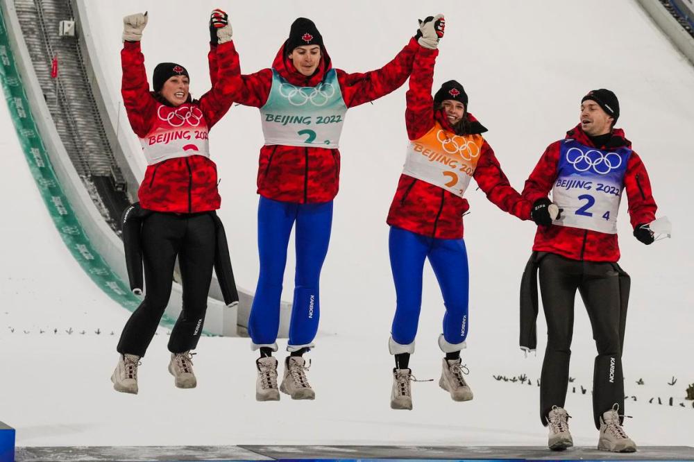 Matthias Schrader - The Associated Press
From left, Alexandria Loutitt, Matthew Soukup, Abigail Strate and Mackenzie Boyd-Clowes won bronze in the ski jumping mixed team event, one of 13 Canadian bronze medals at the 2022 Beijing Games heading into Sunday.