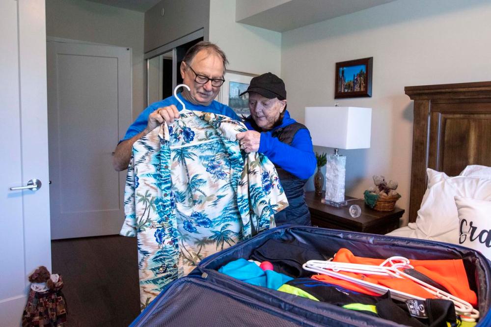 Lars Hagberg - For the Toronto Star
Snowbirds Ann and Steve Harkness pack some of their clothes for their departure for Florida next week at their apartment in Kingston, Ont., on Thursday.