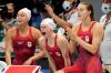 Frank Gunn - THE CANADIAN PRESS
From left: Canada's Kayla Sanchez, Summer McIntosh and Rebecca Smith cheer on teammate Penny Oleksiak, not shown, during the women's 4x200m swimming final event at the Tokyo Olympics on Wednesday.