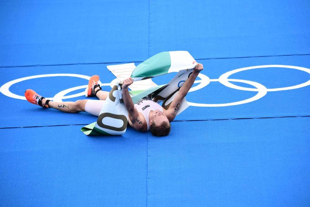 LOIC VENANCE - AFP via GETTY IMAGES
Norway’s Kristian Blummenfelt celebrates finishing first in the men’s triathlon at the Tokyo Olympics.