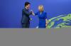 Sean Kilpatrick - THE CANADIAN PRESS
Prime Minister Justin Trudeau is greeted by UK Foreign Secretary Liz Truss as he arrives to COP26 in Glasgow, Scotland, on Nov. 1, 2021. Trudeau has been pointing to Canada as the only oil and gas producer that has figured out how to slap a significant and transparent price on carbon that escalates steeply and redistributes the revenues back to regular people, Heather Scoffield writes.